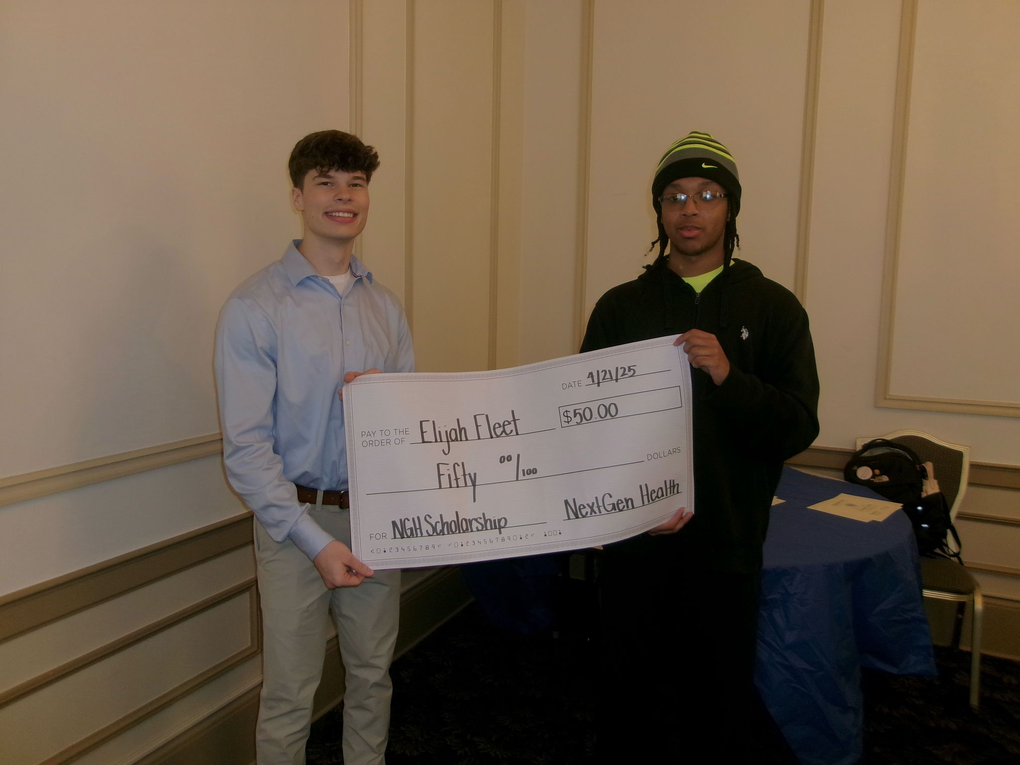 Elijah Fleet receiving award